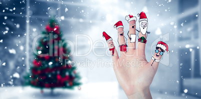 Composite image of christmas caroler fingers