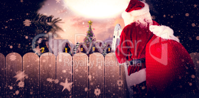 Composite image of santa steps up a ladder