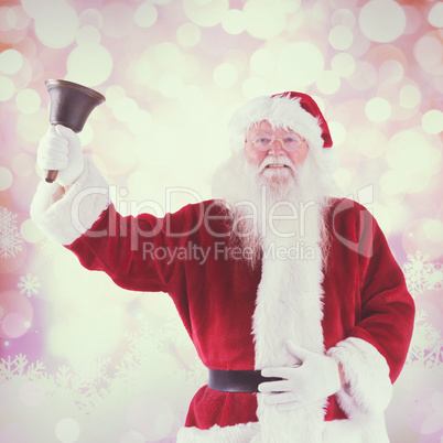 Composite image of santa claus rings his bell