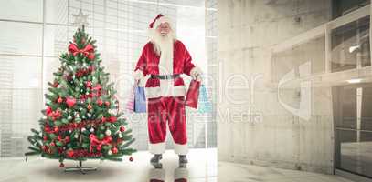 Composite image of santa carries some christmas bags