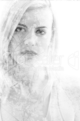 Young girl with leaves in black and white, double exposure
