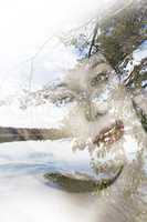 Portrait of a young lady and landscape, double exposure