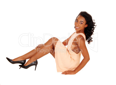 African american woman sitting on floor.