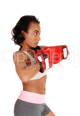 African American woman with boxing gloves.
