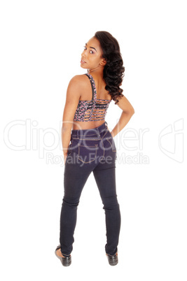 African American woman in jeans from the back.