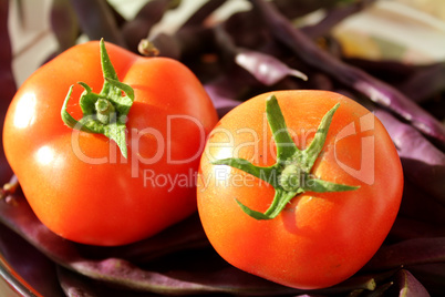 red tomatoes and blue haricots