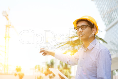Asian Indian male contractor engineer on site