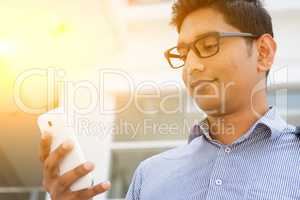 Indian business people using smartphone