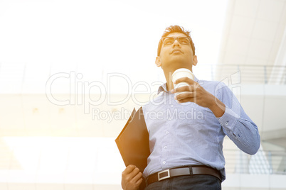 Business people, file folder and hot coffee cup