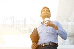 Business people, file folder and hot coffee cup