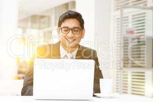 Business people using laptop pc at cafe