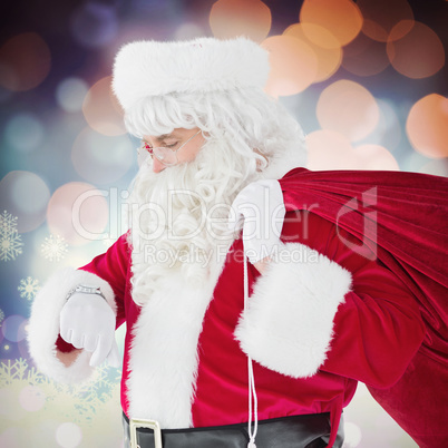 Composite image of festive santa claus checking time