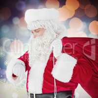 Composite image of festive santa claus checking time