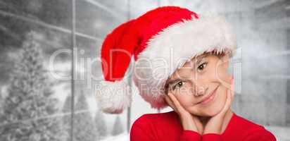 Composite image of festive little girl smiling at camera