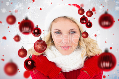 Composite image of happy festive blonde