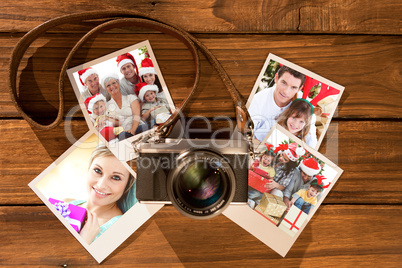 Composite image of children sitting with their family holding christmas boots