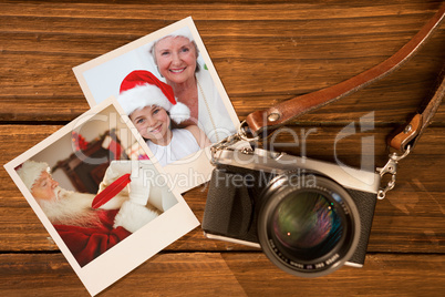 Composite image of smiling grandmother and little girl baking christmas cakes