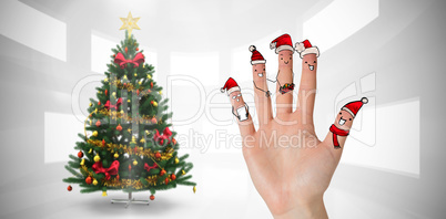 Composite image of christmas caroler fingers