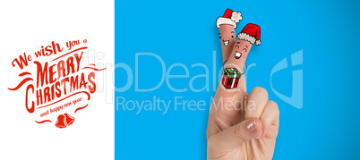 Composite image of christmas fingers