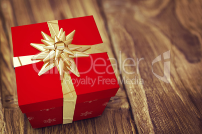 A red Christmas gift with ribbon