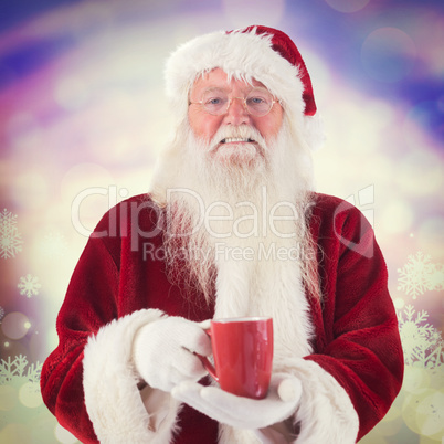 Composite image of santa holds a red cup