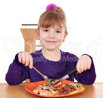 little girl eating a healthy lunch