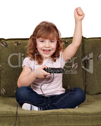 little girl play video games and wins