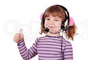 little girl with headphones and thumb up