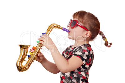little girl with sunglasses play music on saxophone