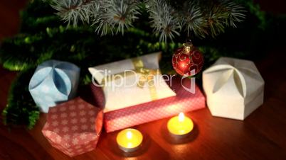 Christmas tree, candles and gifts