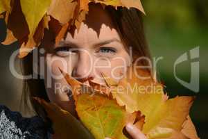 Blue eyes and autumn leaves