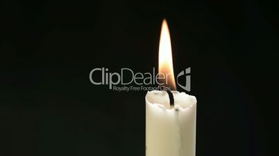 Closeup of a burning candle