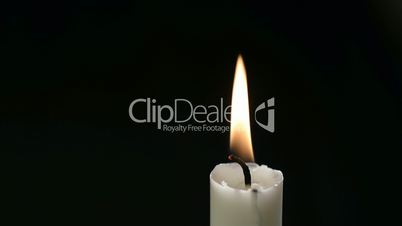 Closeup of a burning candle