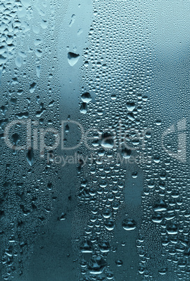 natural water drops on glass