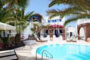 Swimming pool of hotel in traditional Greek style, Santorini isl