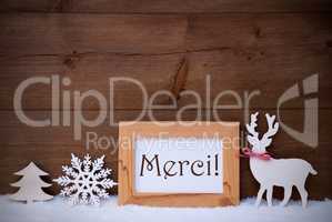 White Decoration On Snow, Text Merci Means Thank You