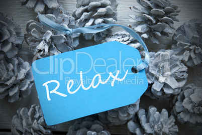 Light Blue Label On Fir Cones With Relax