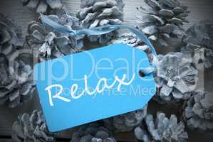 Light Blue Label On Fir Cones With Relax