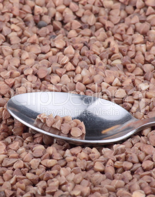 buckwheat background and teaspoon