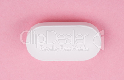 White Pill on Pink Background