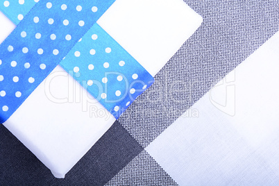 White gift box with blue ribbon