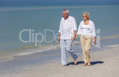 Happy Senior Couple Walking Holding Hands Tropical Beach