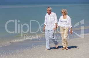 Happy Senior Couple Walking Holding Hands Tropical Beach