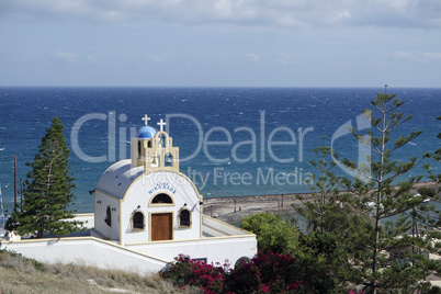 small and traditional greece chapel in perissa