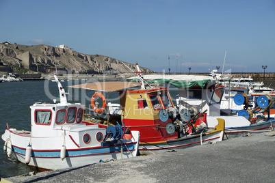 small harbor of porto castello on santorini