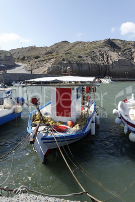 small harbor of porto castello on santorini