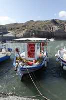 small harbor of porto castello on santorini