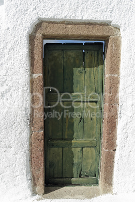 door in small greece village exo gonia on santorini