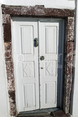 colorful door in oia village on santorini island