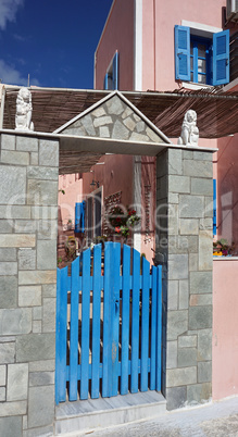 colorful door in oia village on santorini island